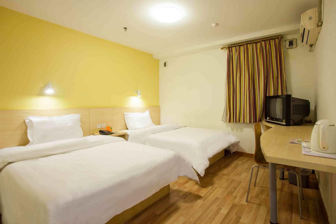 7 Days Inn Yangjiang Xinyue International Studio Zimmer foto
